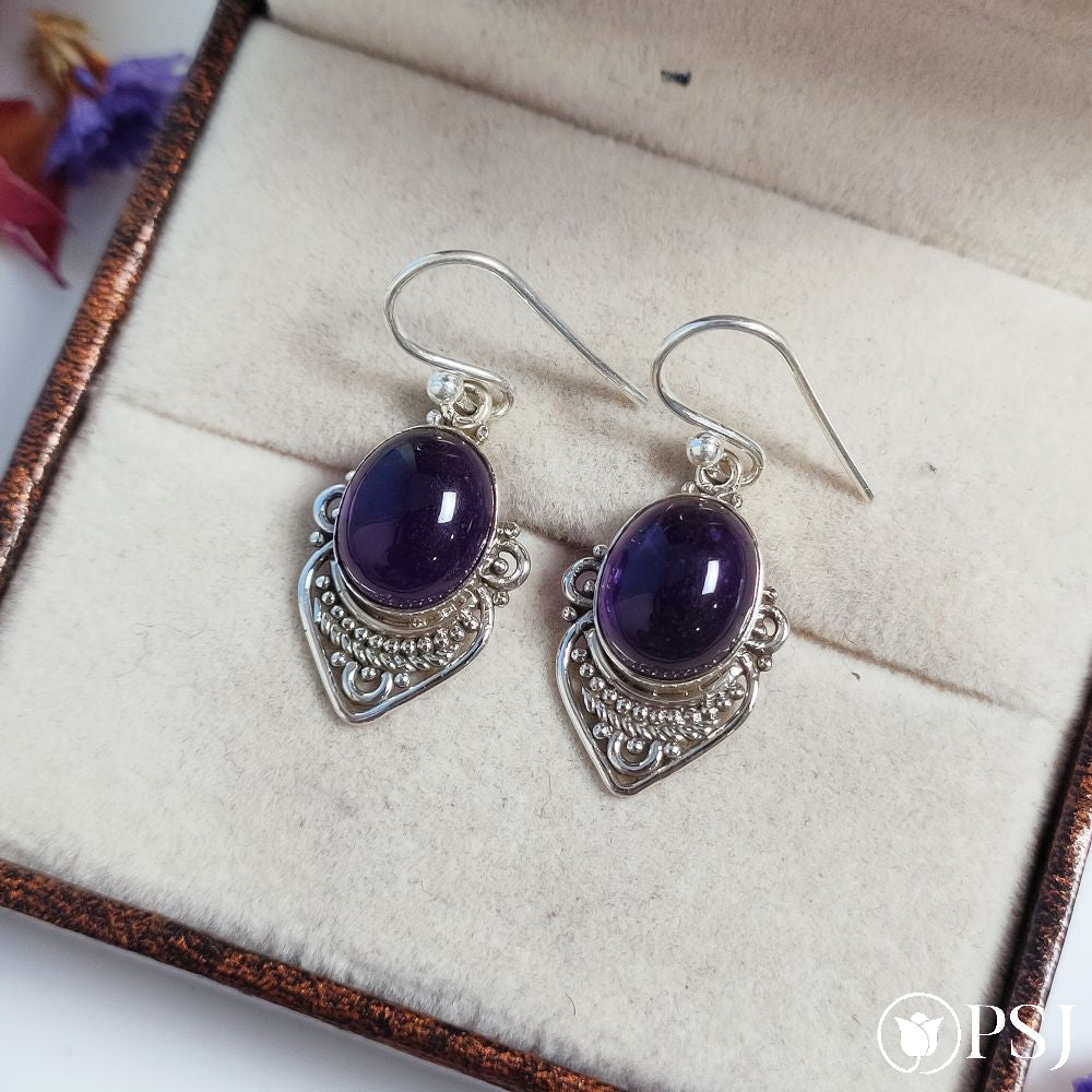 Classic Sterling Silver Drop Earrings with Amethyst Jewels - Wisdom  Marchioness | NOVICA